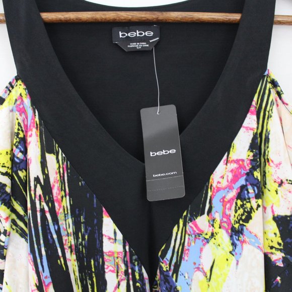 ⬇️$15 Bebe Black & White Cold Shoulder V-Neck Top - Picture 5 of 16